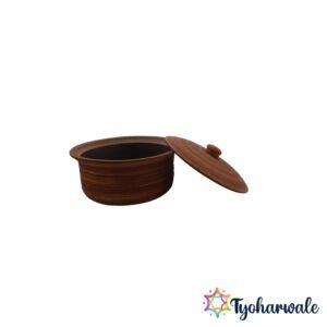 Traditional clay kadhai with matching lid for healthy Indian cooking.