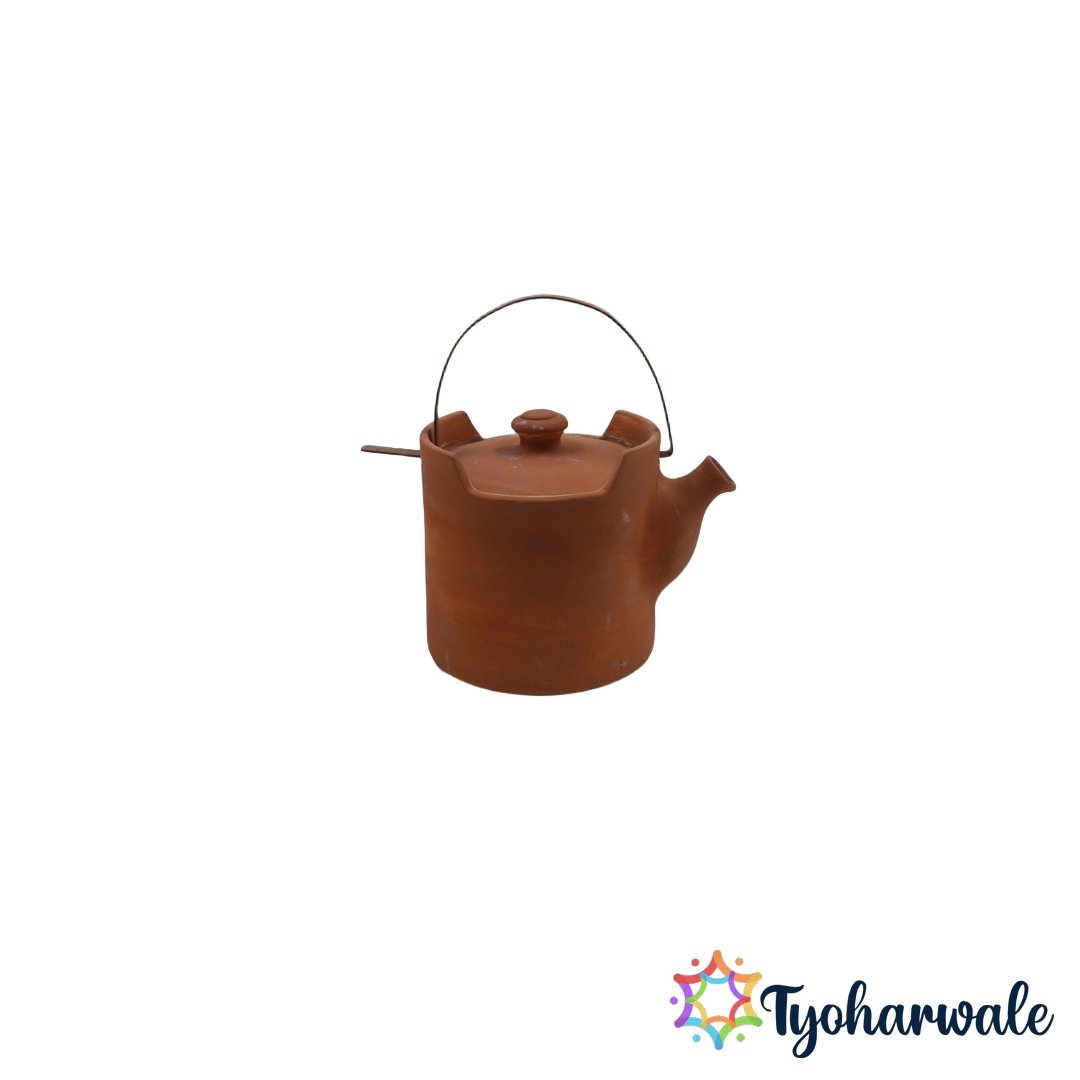Large traditional clay teapot with wire handle and lid for serving tea.