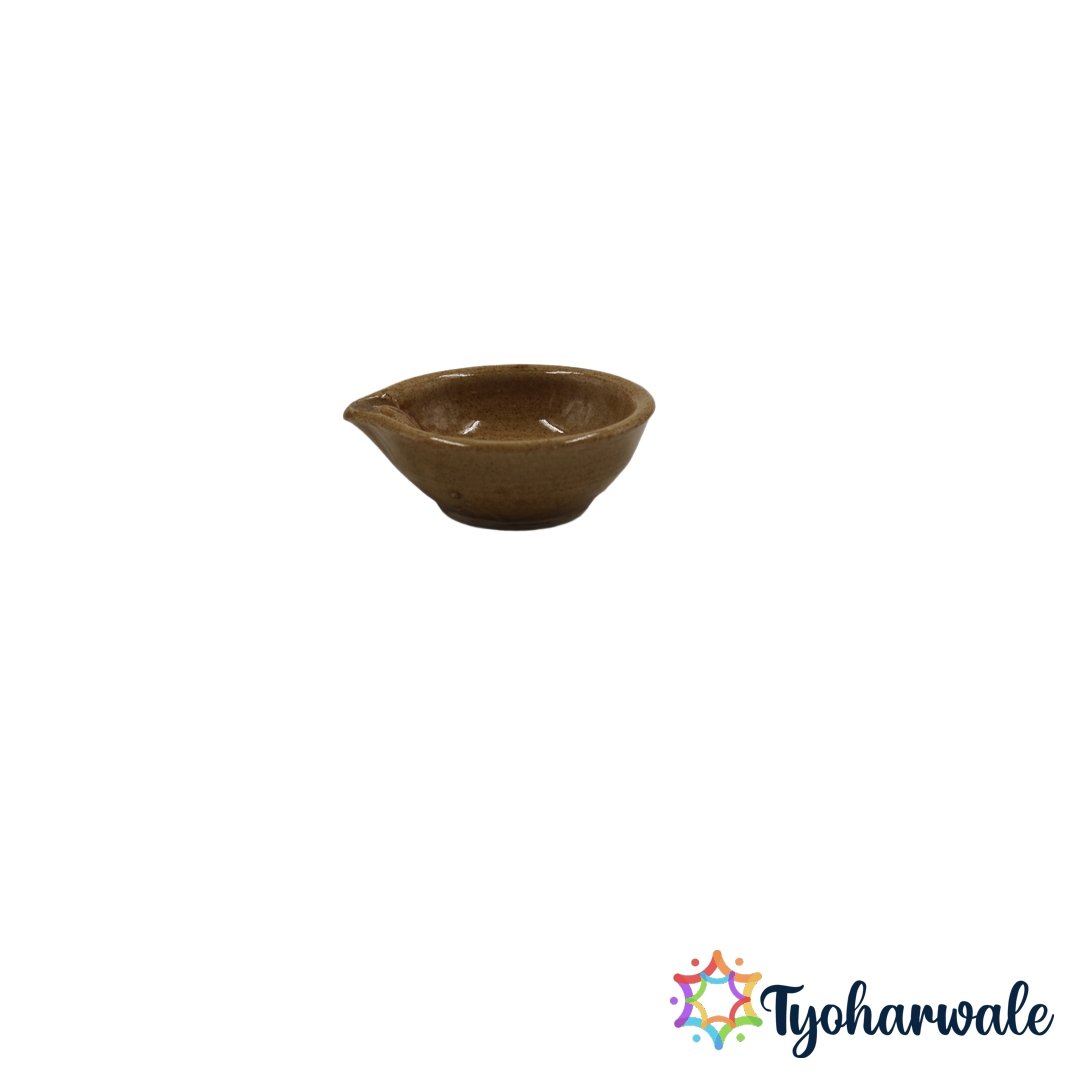 Traditional yellow Angan diya for Diwali and pooja decoration.