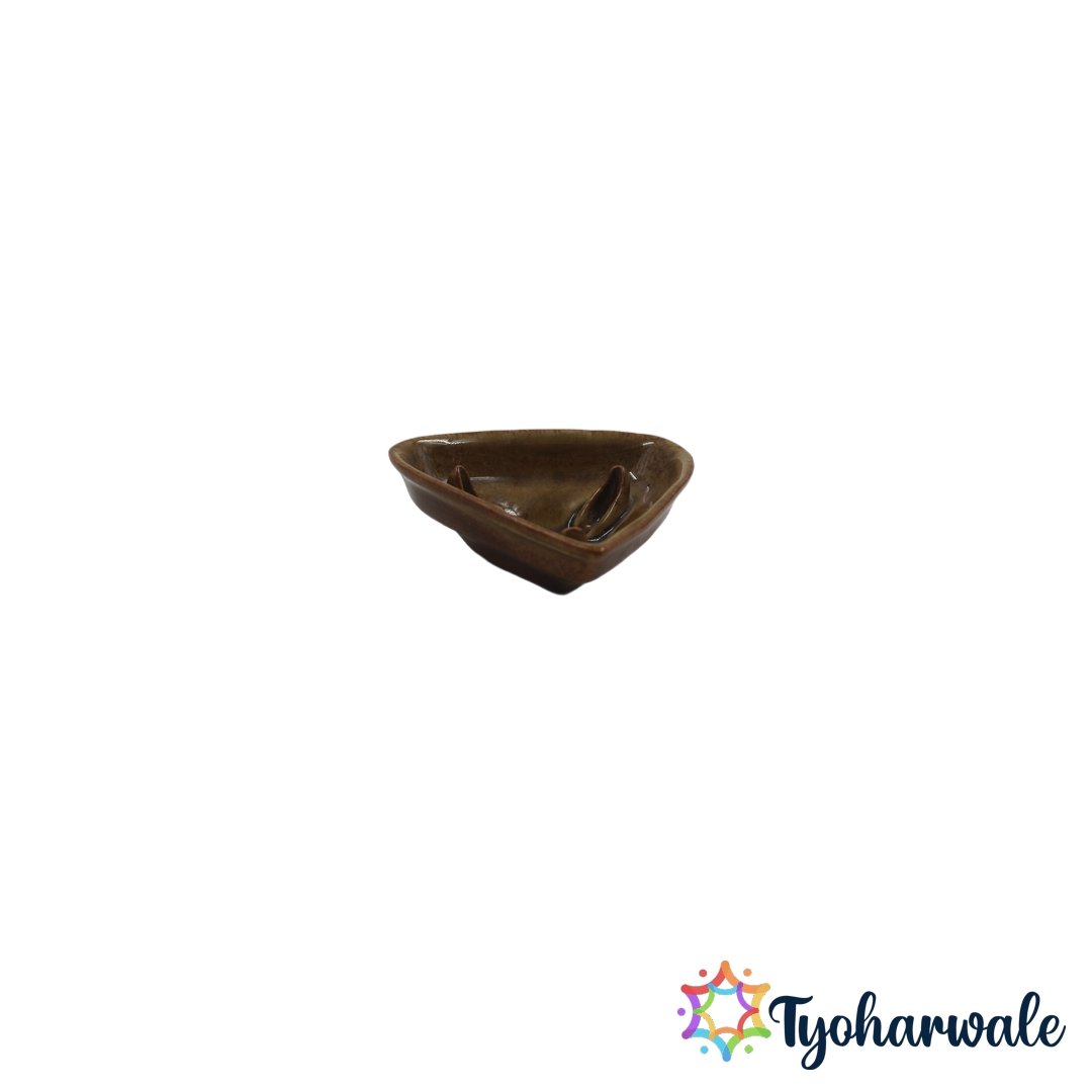 Traditional brown triangular floating diya for Diwali and water décor.