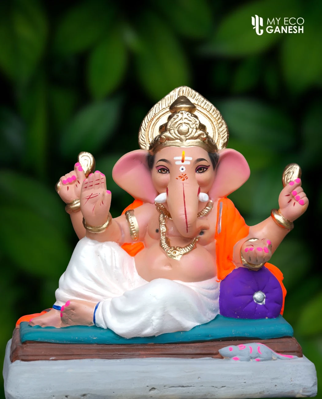 12 Inch Advinayak Relaxing on Load with white dhotar and orange uparna