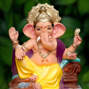 18 Inch Relaxing Pose Ganeshji with yellow dhotar and purple uparna