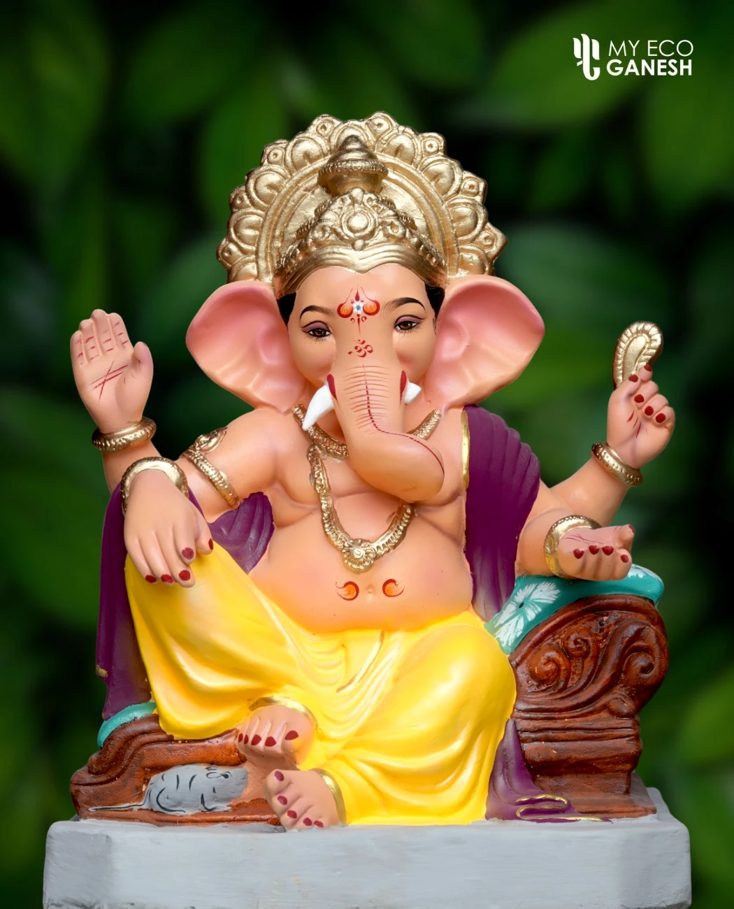 18 Inch Relaxing Pose Ganeshji with yellow dhotar and purple uparna