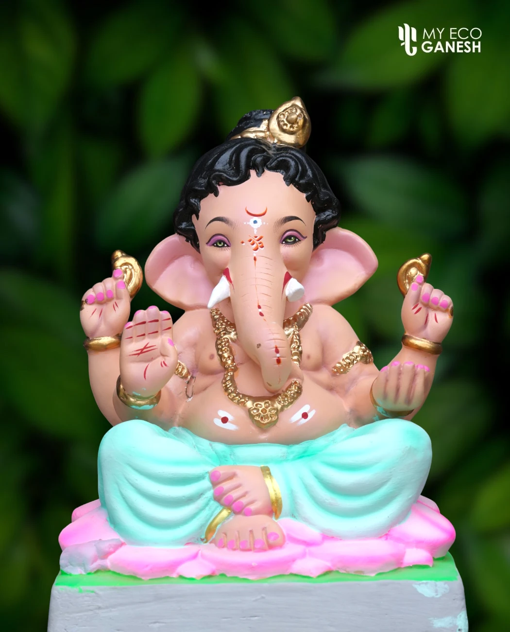 15 Inch Mrudul Ganesha with blue dhotar seated on a pink Kamalasana