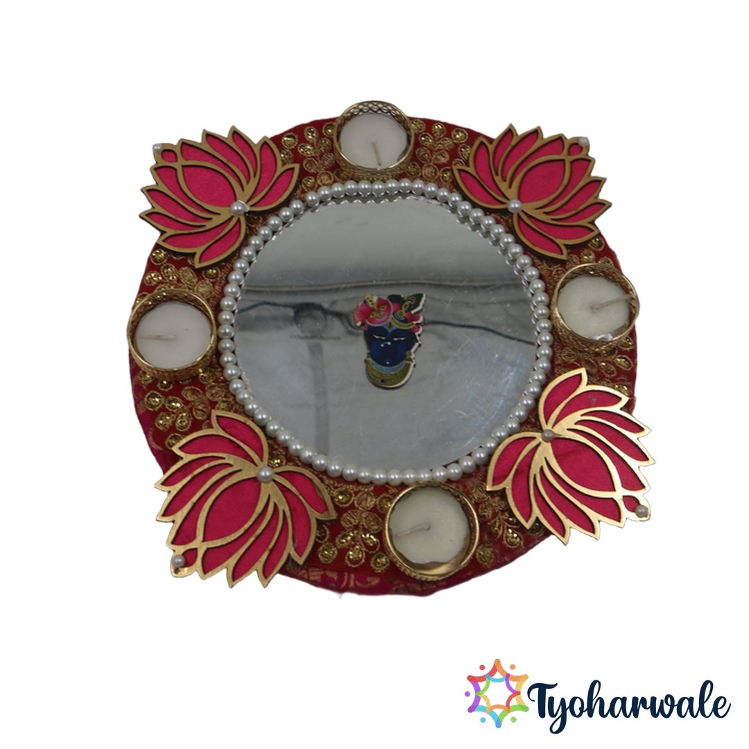 Lotus mirror candle thali on red fabric base with centre mirror and 5 tea light holders