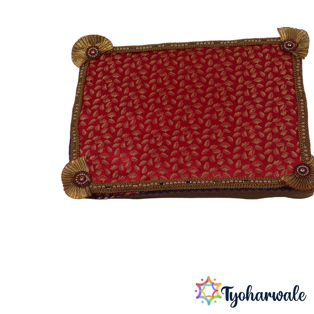 Wooden red ganpati paat chowki with luxurious red gold leaf fabric and corner embellishments