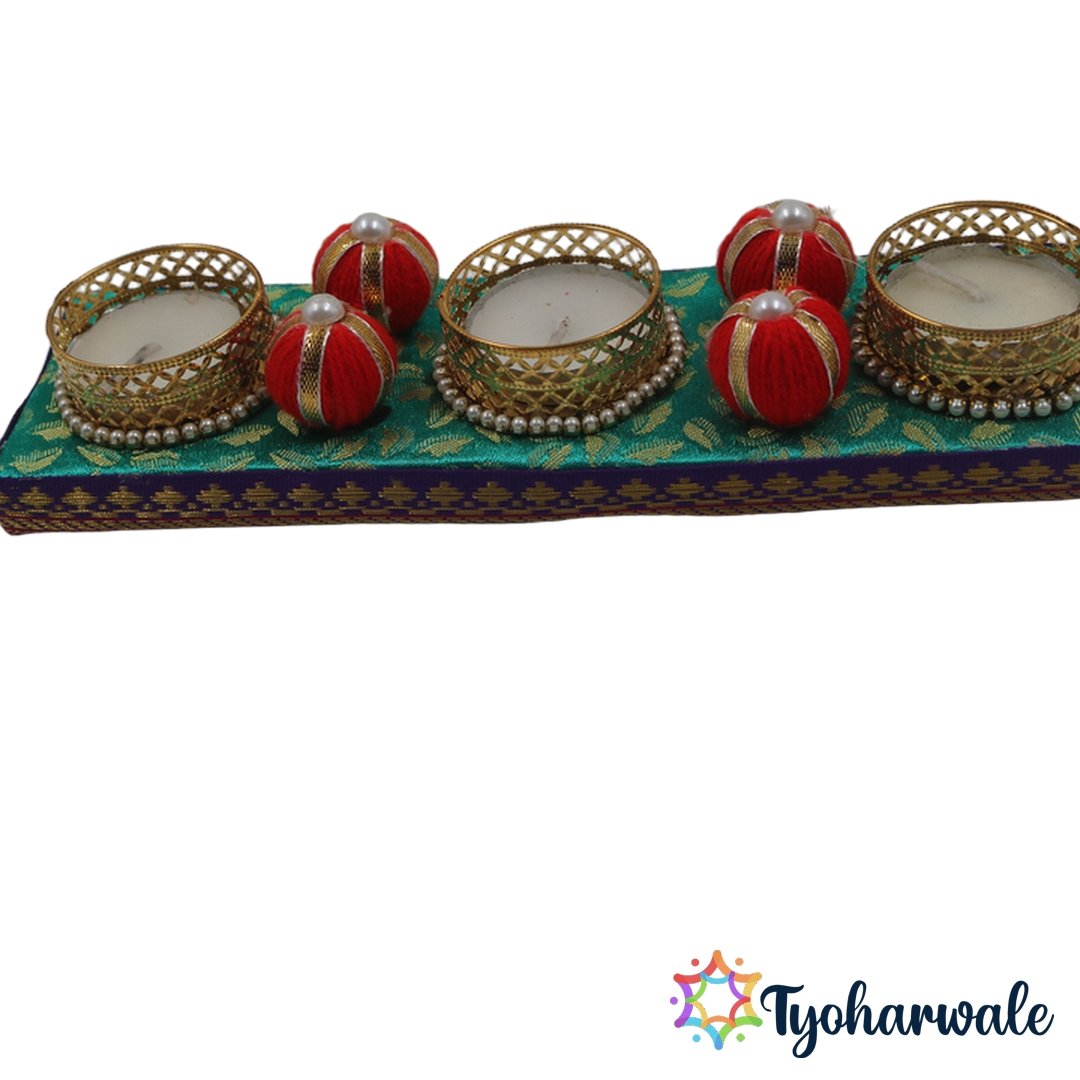 Teal candle holder set with 3 golden jali tea light holders on MDF base