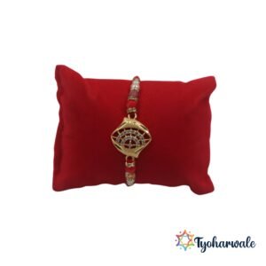 Stone charm beaded Rakhi with red thread and pearl beads