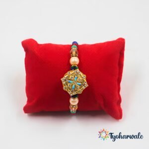 Colourful beaded Rakhi for brother with blue flower-like charm and multicolour beads