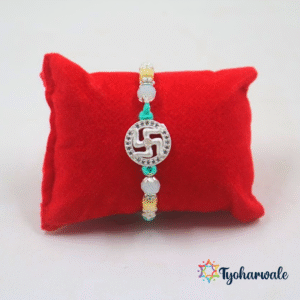 Swastik charm Rakhi with silver-tone centre and beaded thread