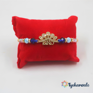 Stylish BRO charm beaded Rakhi with gold-tone centre, blue beads and shimmering stone details