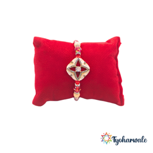 Elegant star charm beaded Rakhi with red thread, colourful beads and shimmering stone work