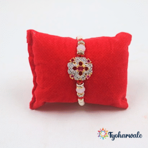 Elegant dark pink pearl beaded Rakhi with sparkling flower-style centre charm