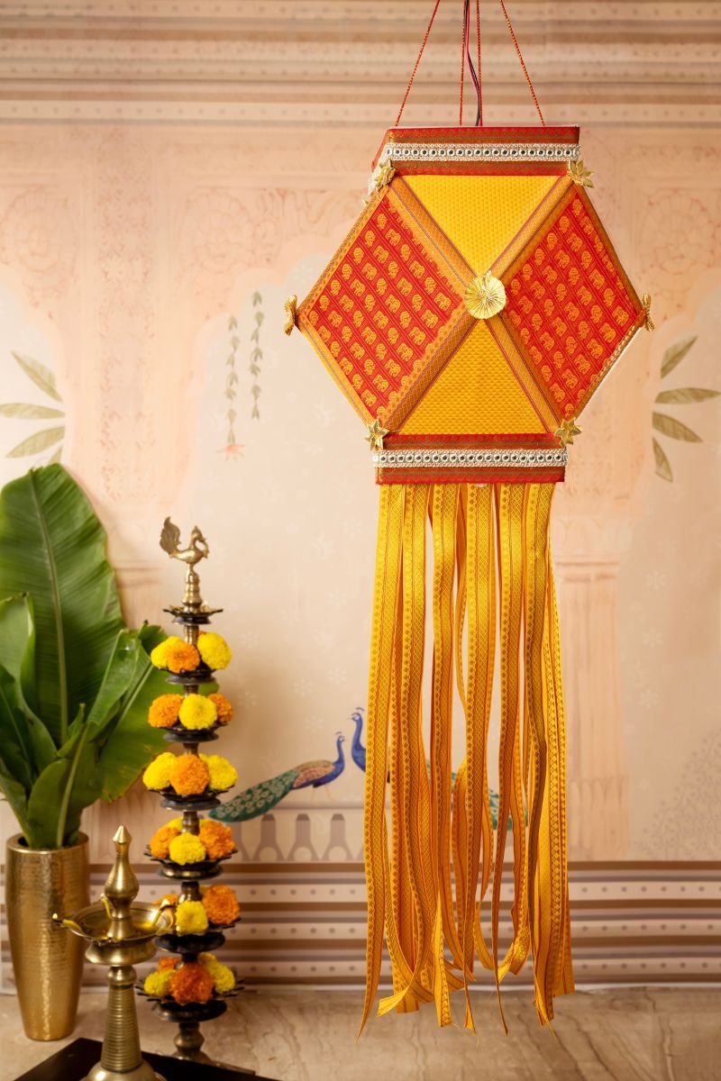 Red and yellow Khun Kandil made with premium Khun fabric for Diwali decoration